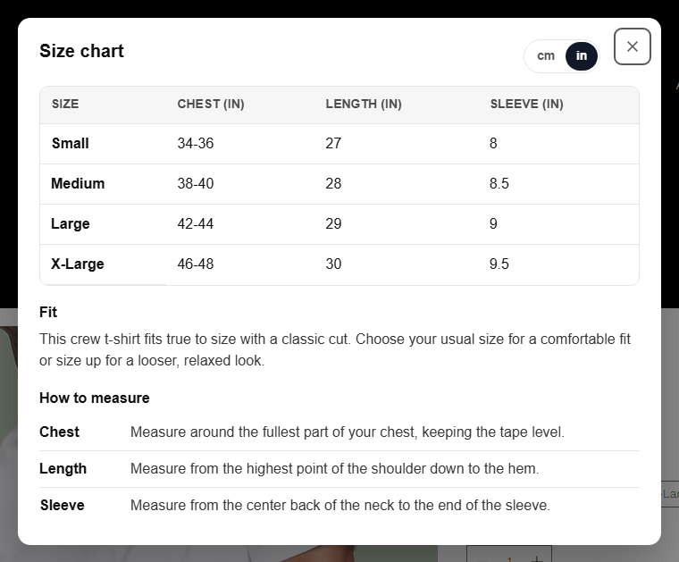 The Size guide pop-up: size table with chest, length and sleeve, a cm/in switch, fit notes and measuring tips